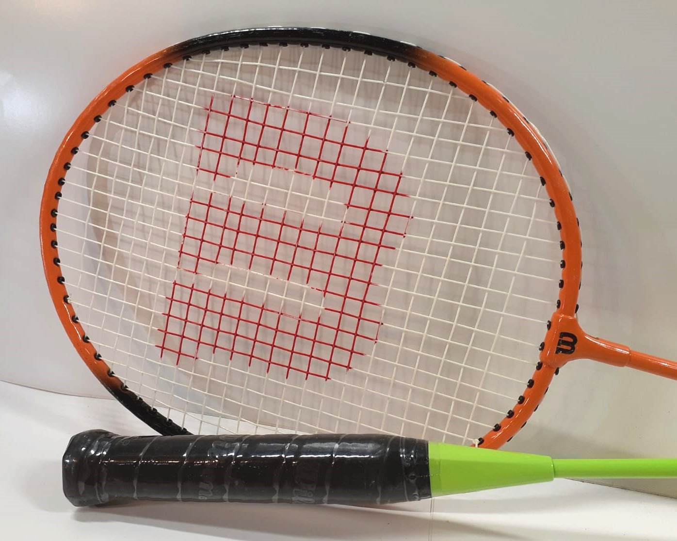 racquet and shuttlecock